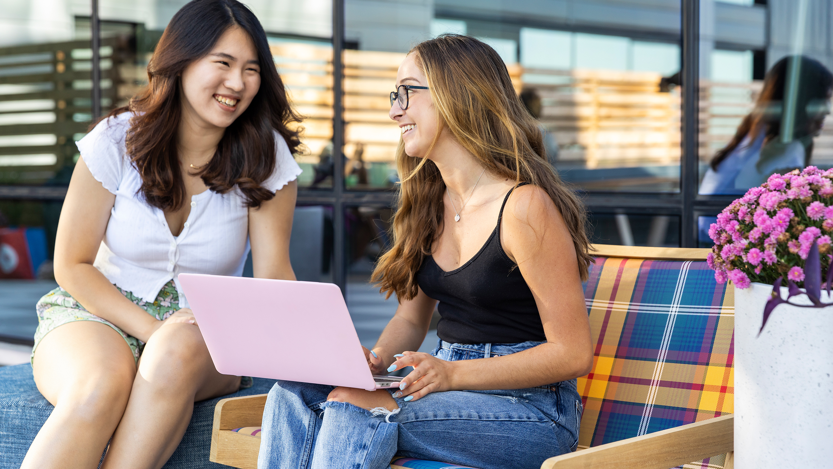 Friends using a laptop